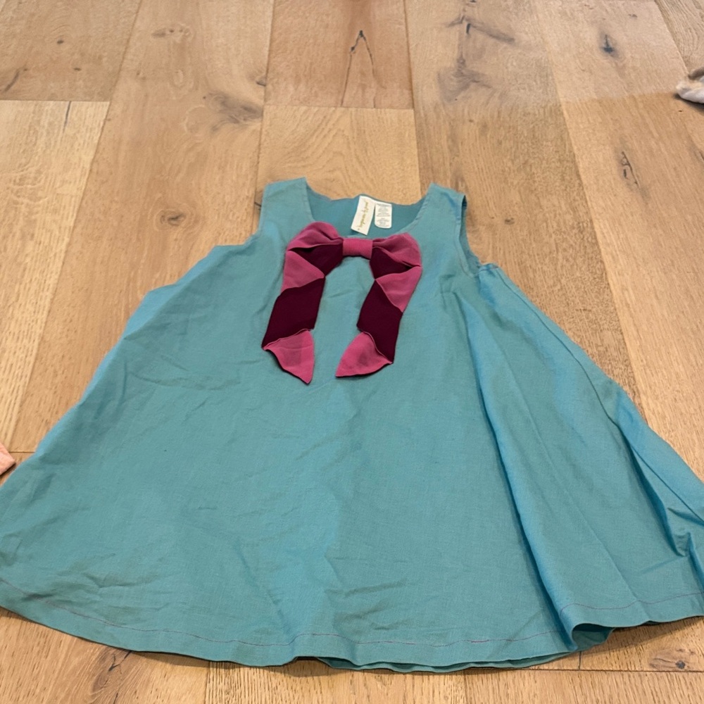 Blue Sleeveless Dress with Pink and Red Bow